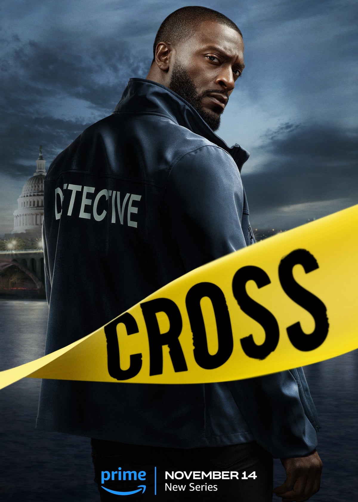 Promotional poster for Cross Season 1 featuring detective Alex Cross, played by Aldis Hodge, looking back with a serious expression. He stands against a gritty, dark background showing the Washington D.C. skyline with the U.S. Capitol building dimly lit.
