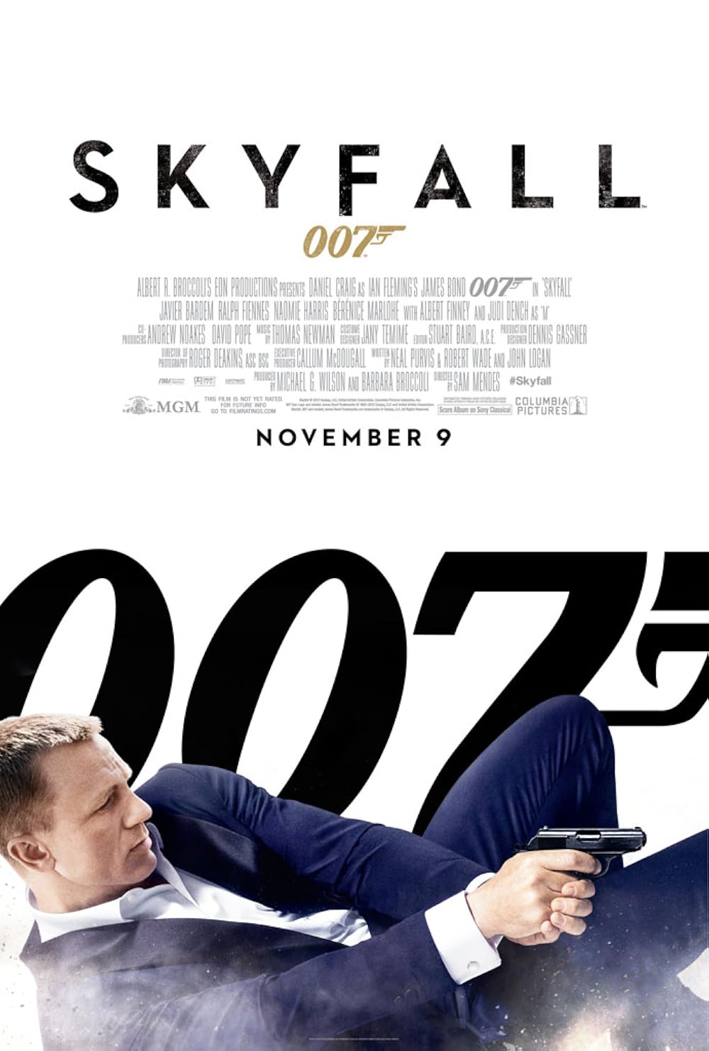 Movie poster for 'James Bond: Skyfall' featuring Daniel Craig on the ground holding a prop weapon. A classic black-and-white 007 gun barrel logo. 
(Camera Equipment)