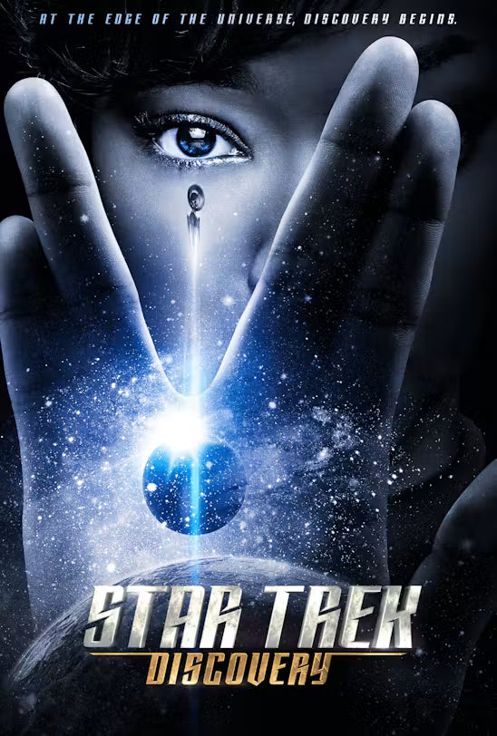 Promotional poster for 'Star Trek Discovery' season 1  featuring a close-up of a person's face and hands forming a gesture over a glowing blue portal in space, with the title 'STAR TREK DISCOVERY' at the bottom.